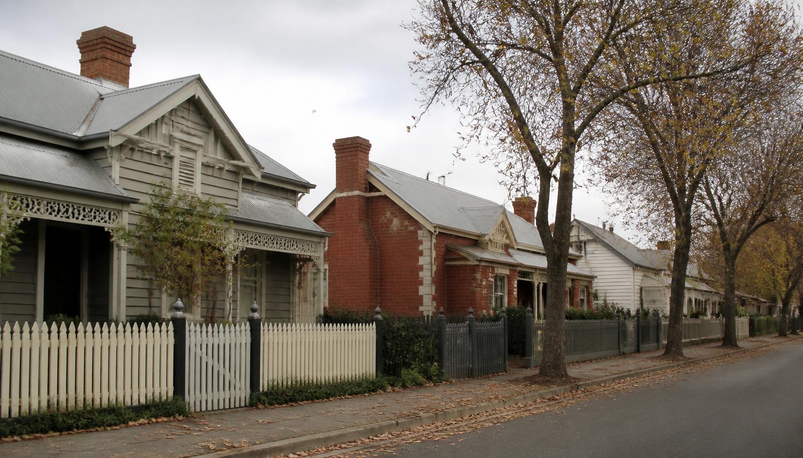 Heritage weatherboard and brick homes on a tree-lined Ballarat street